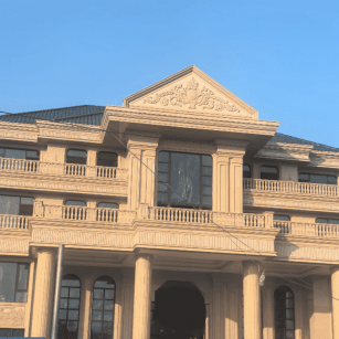 青海黄金麻别墅外墙干挂石材效果示例