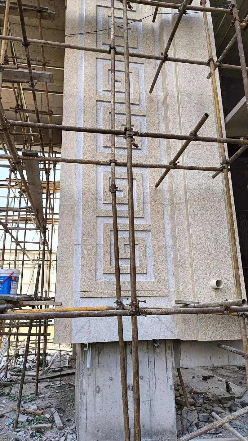 青海 黄金麻花岗岩别墅外墙干挂回纹造型效果