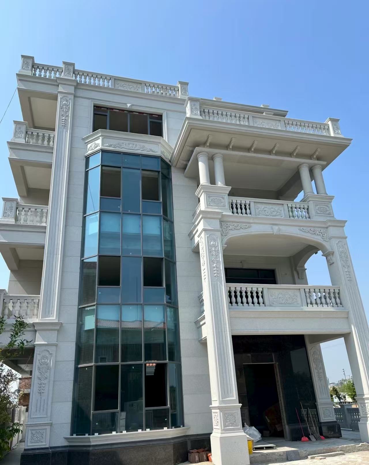 青海 白麻花岗岩别墅外墙干挂效果展示