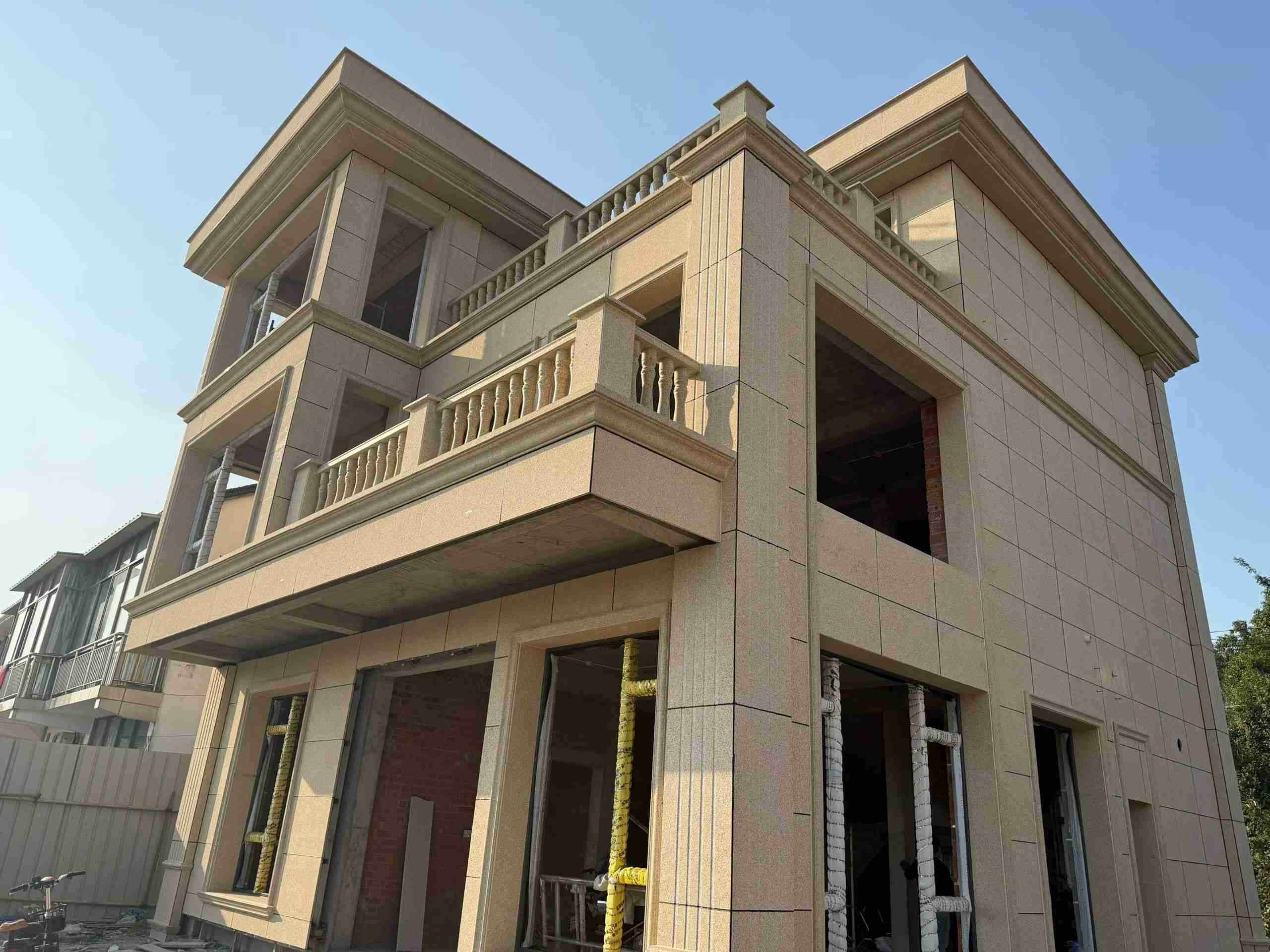 青海 黄金麻花岗岩石材荔枝面外墙干挂效果展示